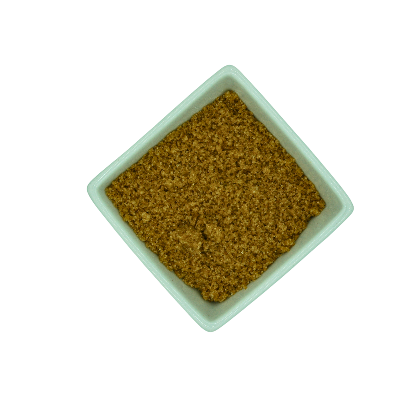 Square white dish filled with brown granular sugar on a white background