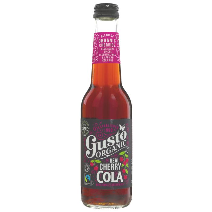 A bottle of Gusto Organic Real Cherry Cola on a plain white background. The glass bottle shows the reddish-brown cola liquid inside, with a black cap and a black label featuring white and pink text and cherry illustrations.