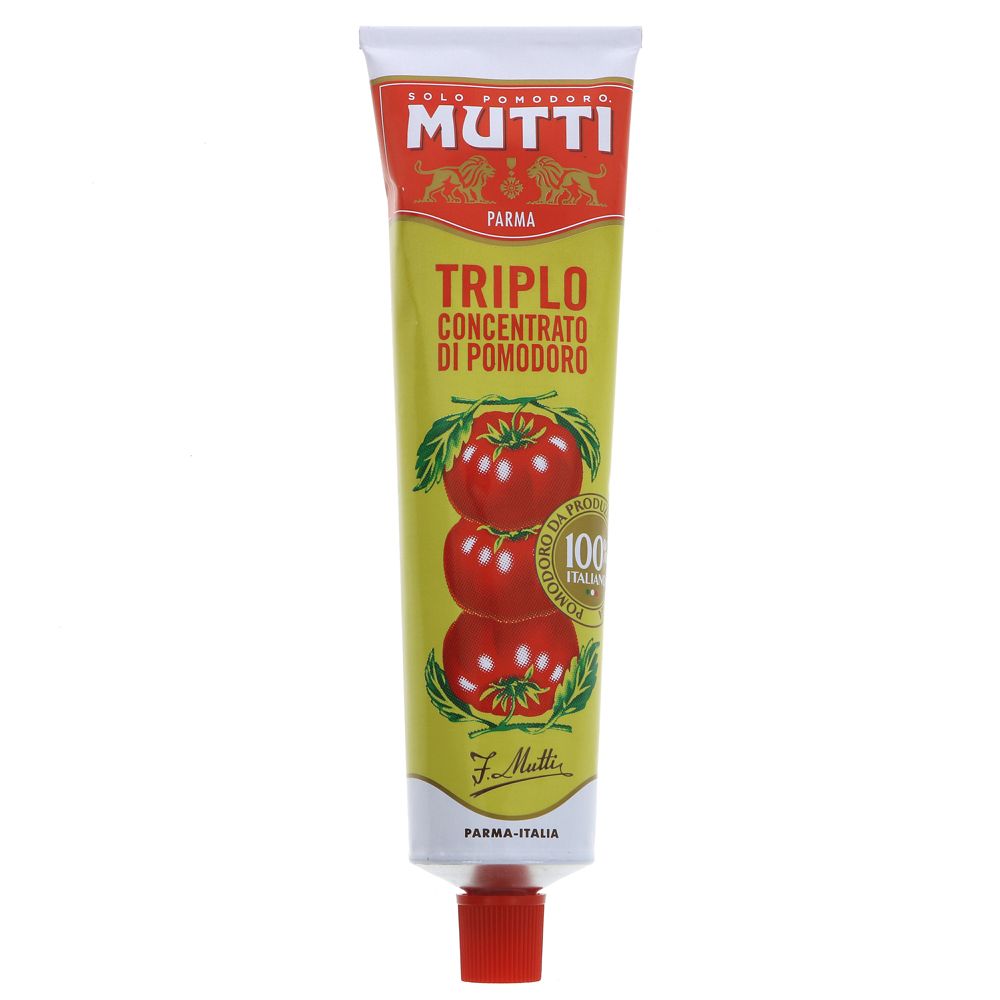 tube of tomato puree on white background