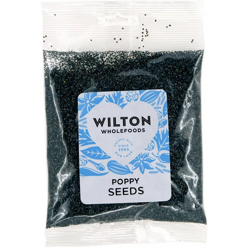Bag of poppy seeds with a Wilton Wholefoods label on a white background