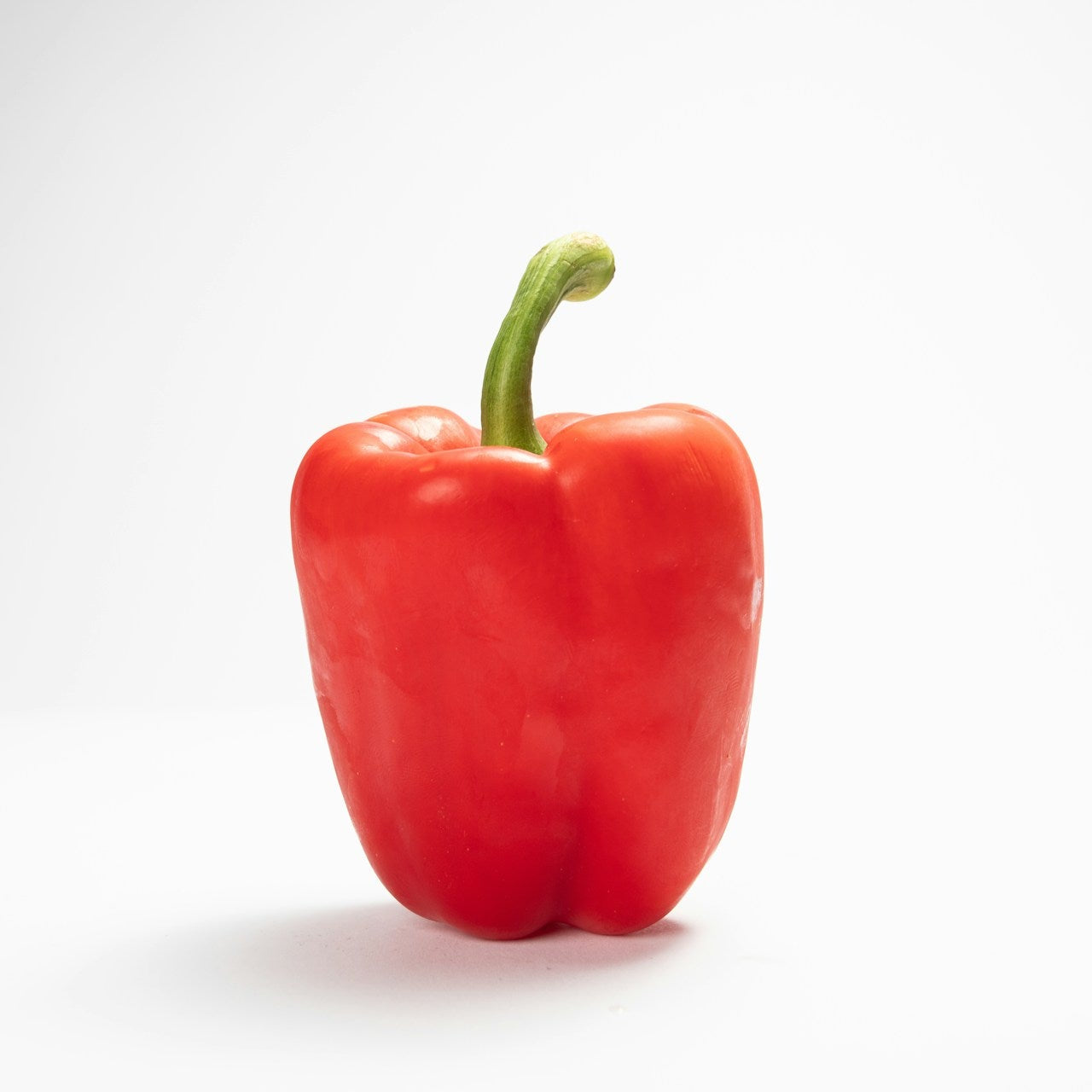 Red bell pepper on a white background