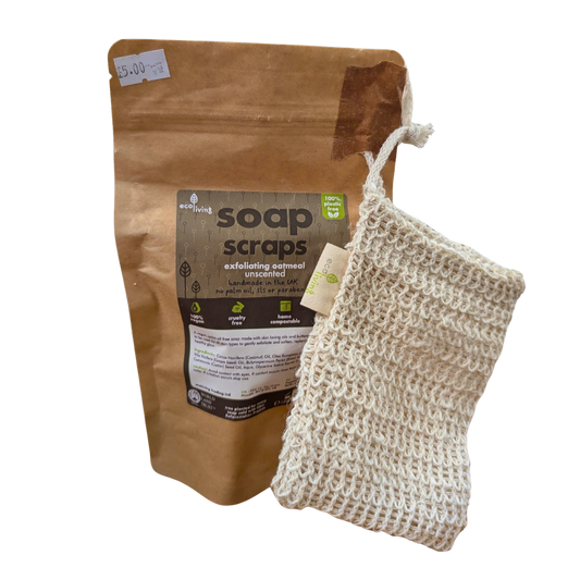 Brown bag of soap scraps with a natural fiber soap scrubbie on a white background