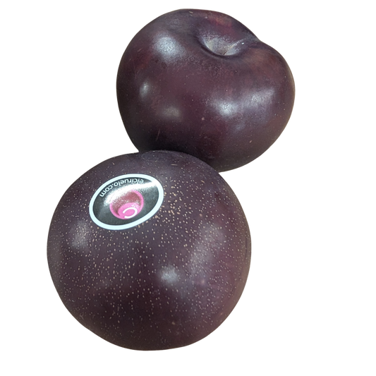 Two plums with a brand label on a white background