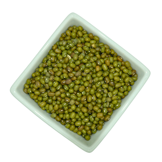 White bowl filled with green mung beans on a white background