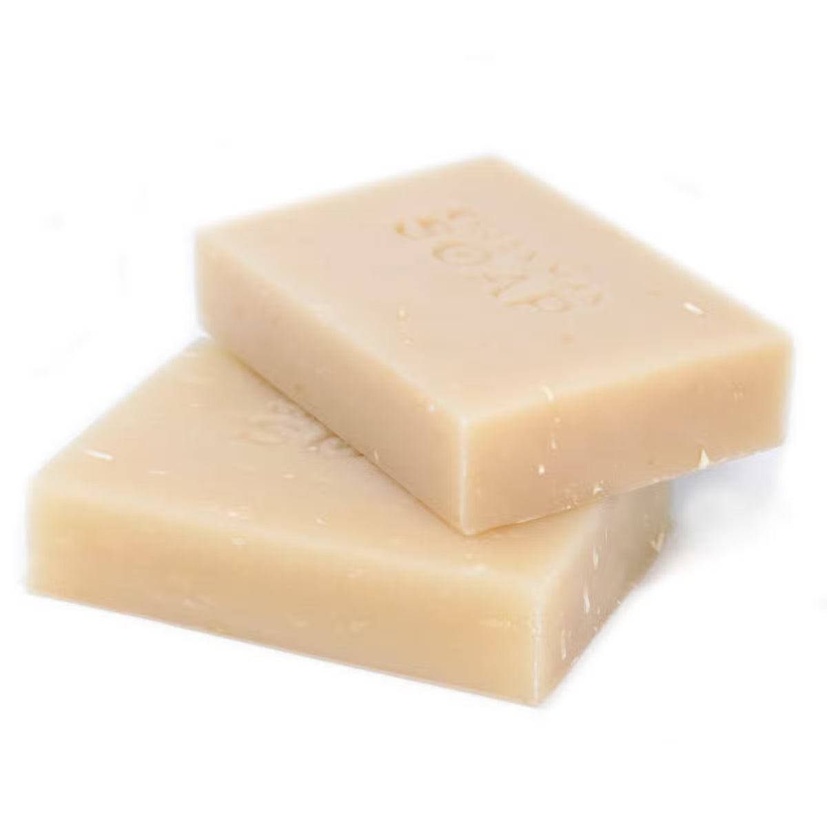 Two bars of soap stacked on a white background