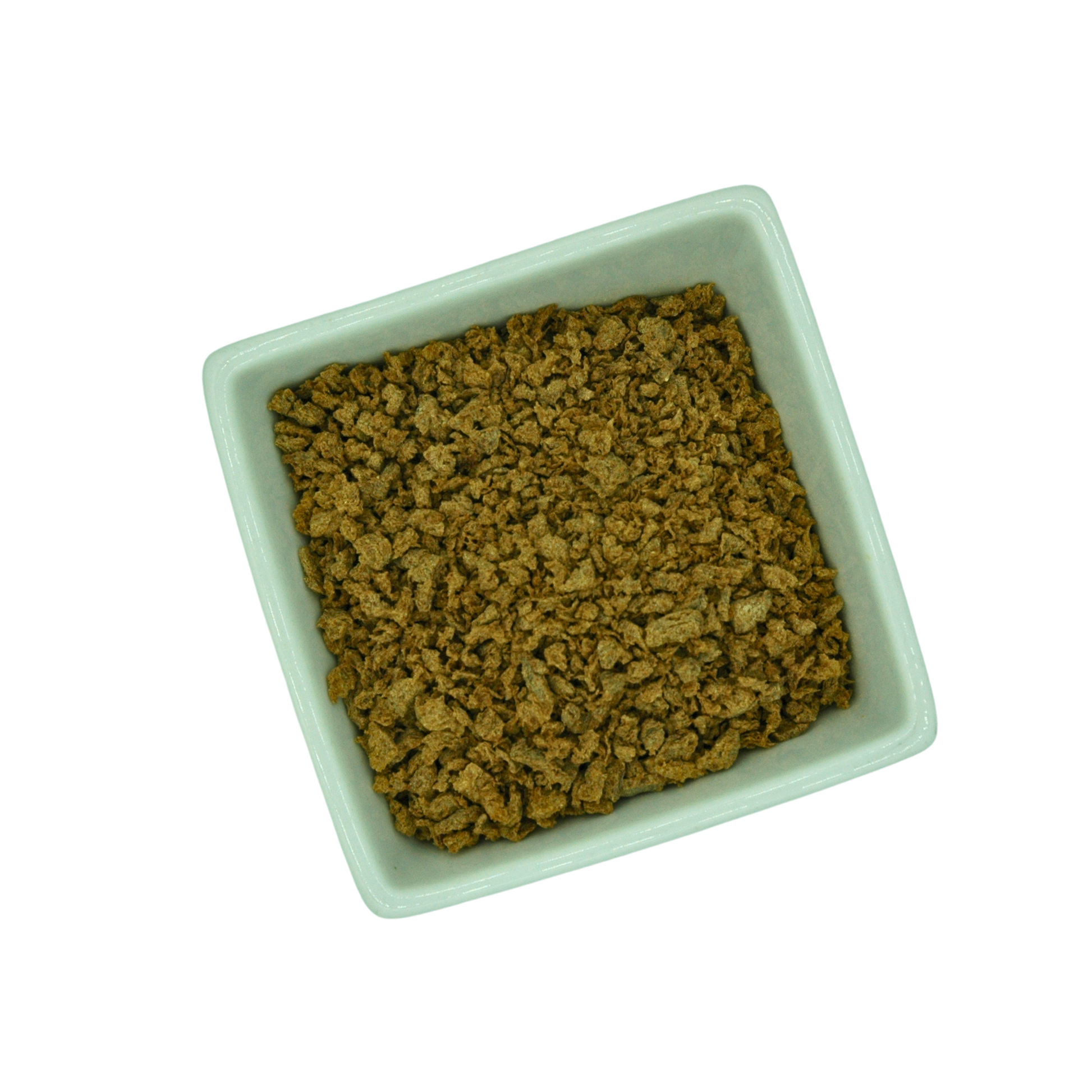 Square white bowl filled with dried tvp mince on a white background