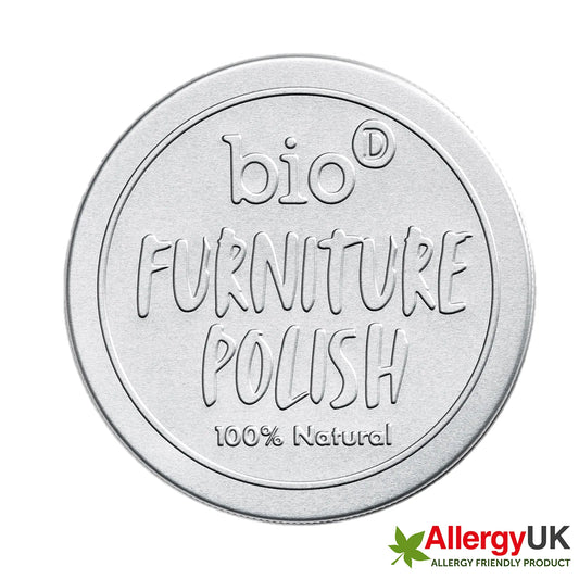 Circular container lid for bio furniture polish with '100% Natural' text on a white background.