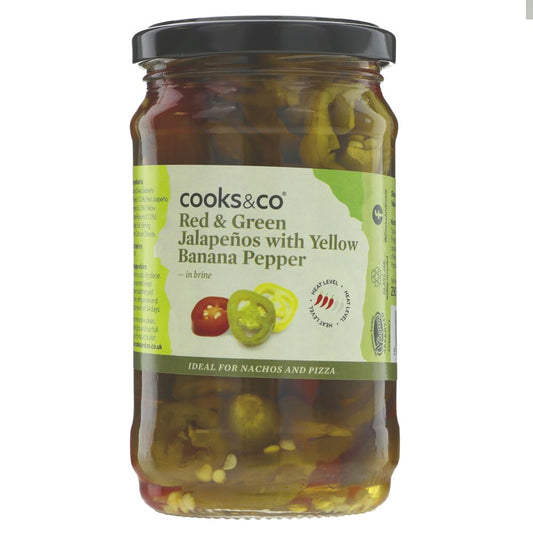 Jar of red and green jalapeños with yellow banana pepper by cooks&co on a white background