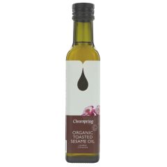 Bottle of organic sesame oil with a label on a white background