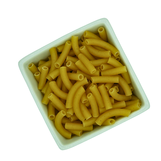 Yellow small macaroni pasta in a white bowl on a white background