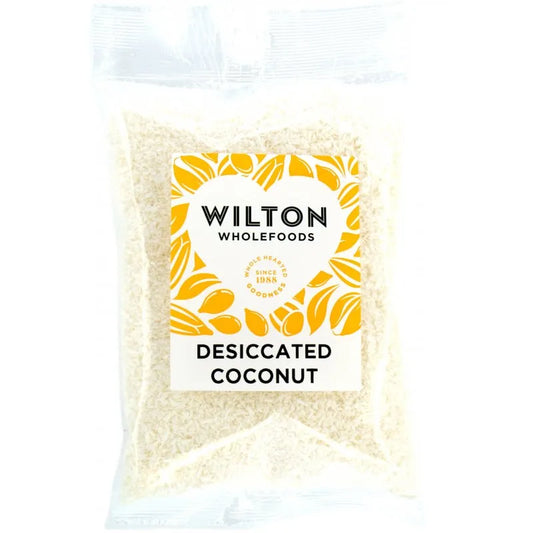 Bag of desiccated coconut with a Wilton Wholefoods label on a white background