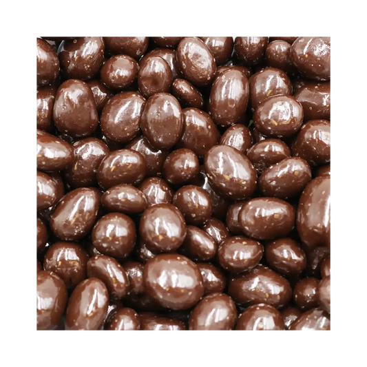 Close-up of chocolate-covered honeycomb peices on a white background
