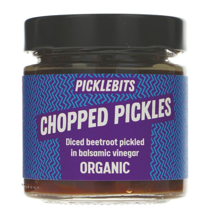 A jar of Picklebits Chopped Pickles, organic diced beetroot pickled in balsamic vinegar, featuring a purple and blue patterned label with a black lid.