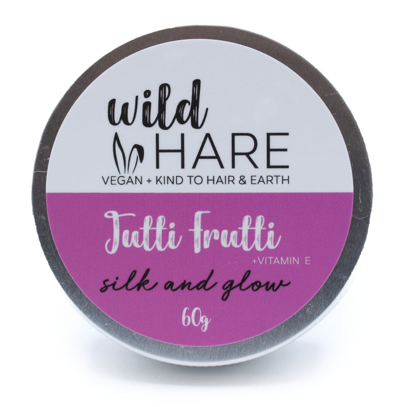 Jar of 'wild HARE' hair product with 'Tutti Frutti' flavor on a white background