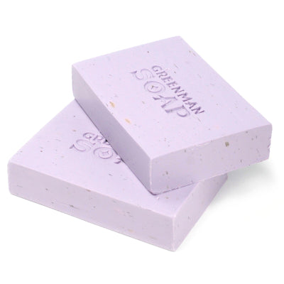 Two bars of purple soap with 'Green Soap' branding on a white background