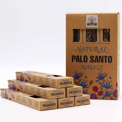 Stack of Palo Santo boxes with a prominent box labeled 'Natural Palo Santo Masala' on a white background.